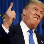 Republican presidential candidate trump gestures and declares "you're fired!" at a rally in manchester